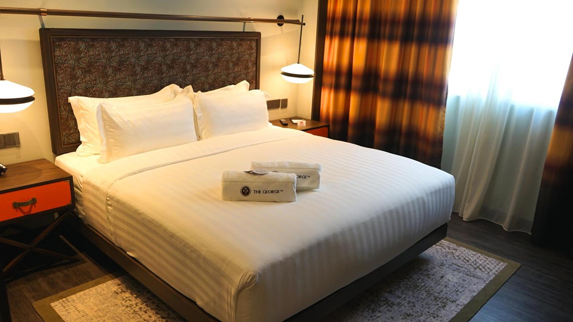 The George Penang By The Crest Collection Hotel George Town Exterior photo A bed in a hotel room